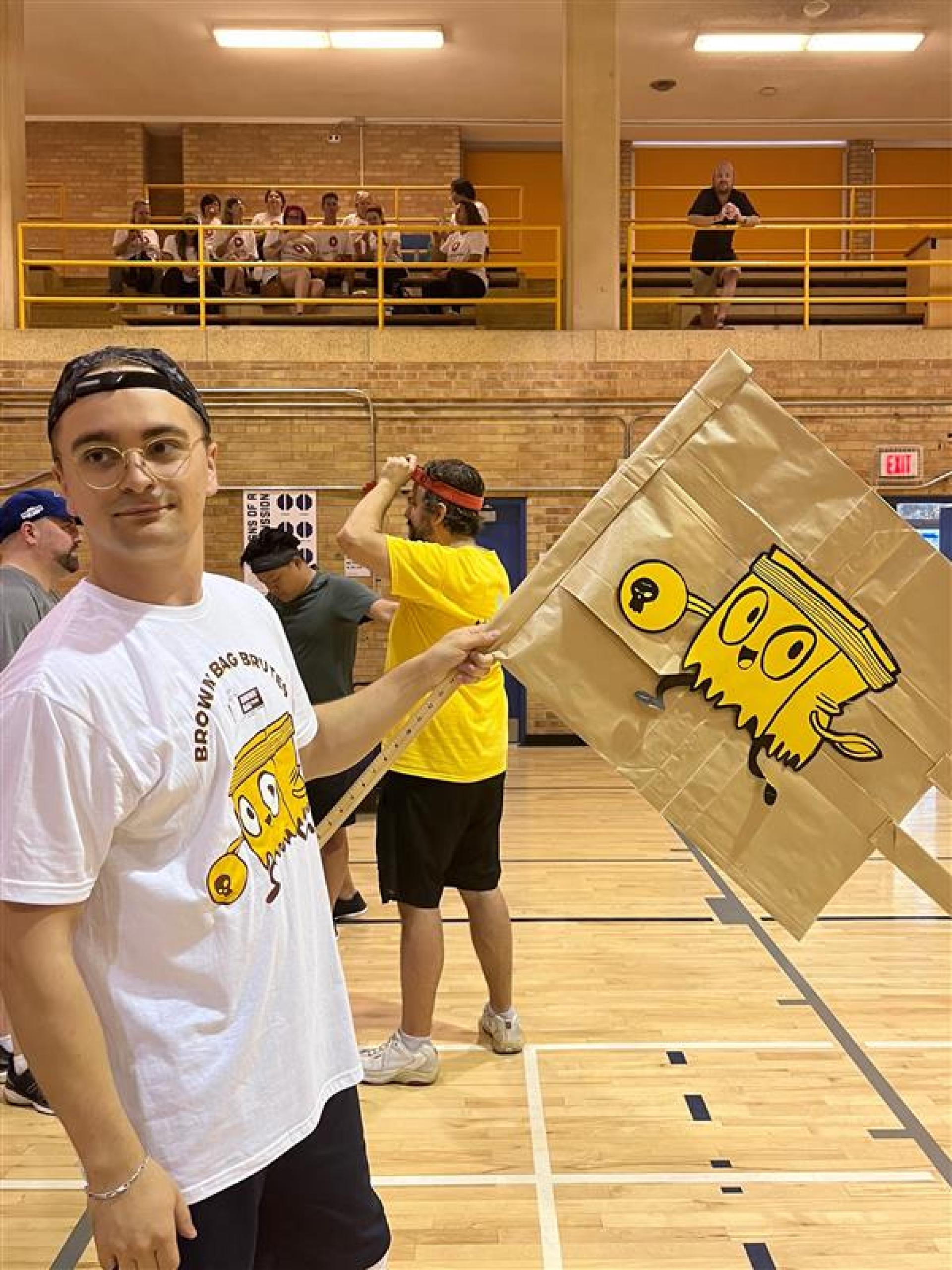 Brown Bag Films at dodge ball tournament - player holding a flag