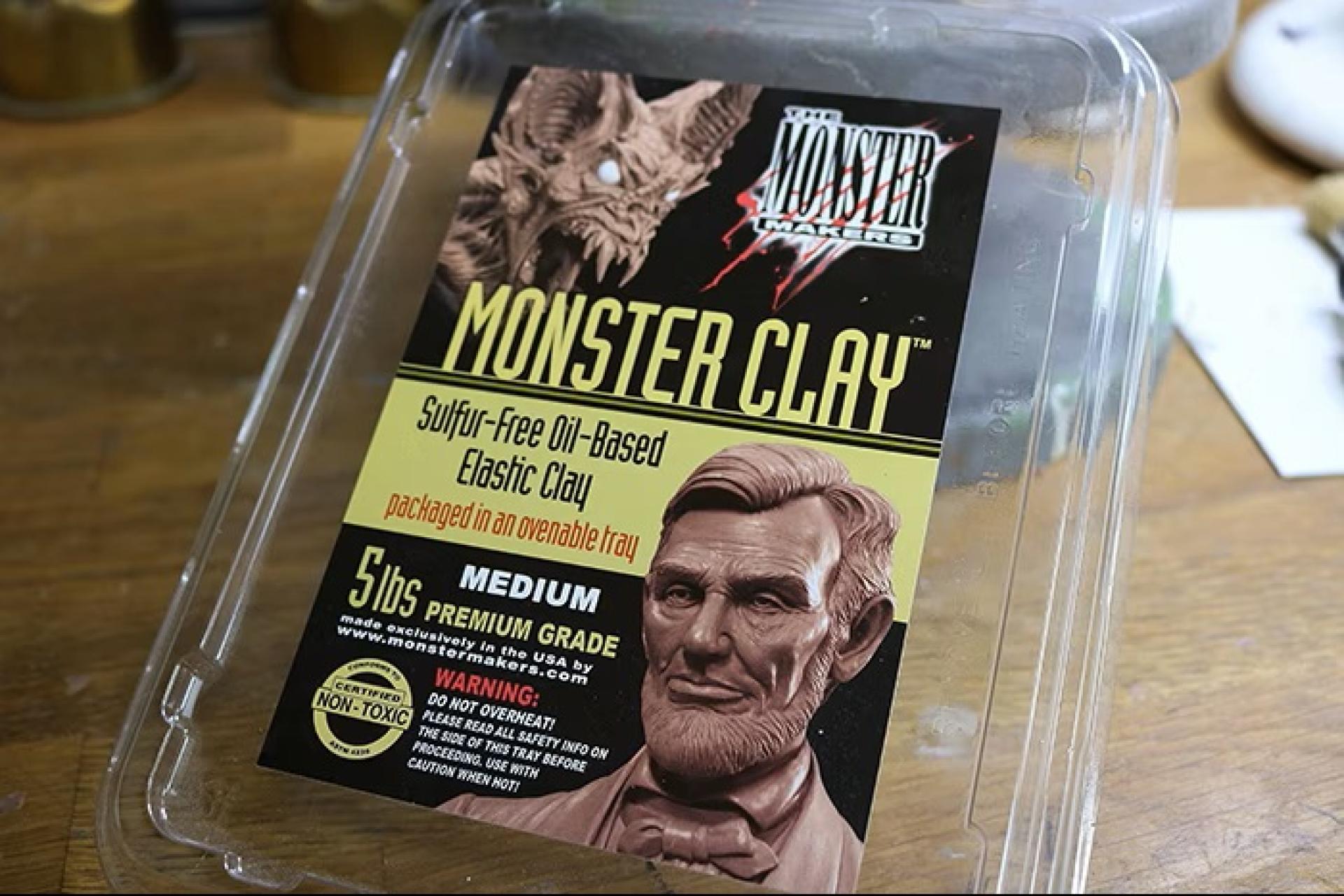Package of Monster Clay sulfur-free oil-based elastic clay in an ovenable tray.