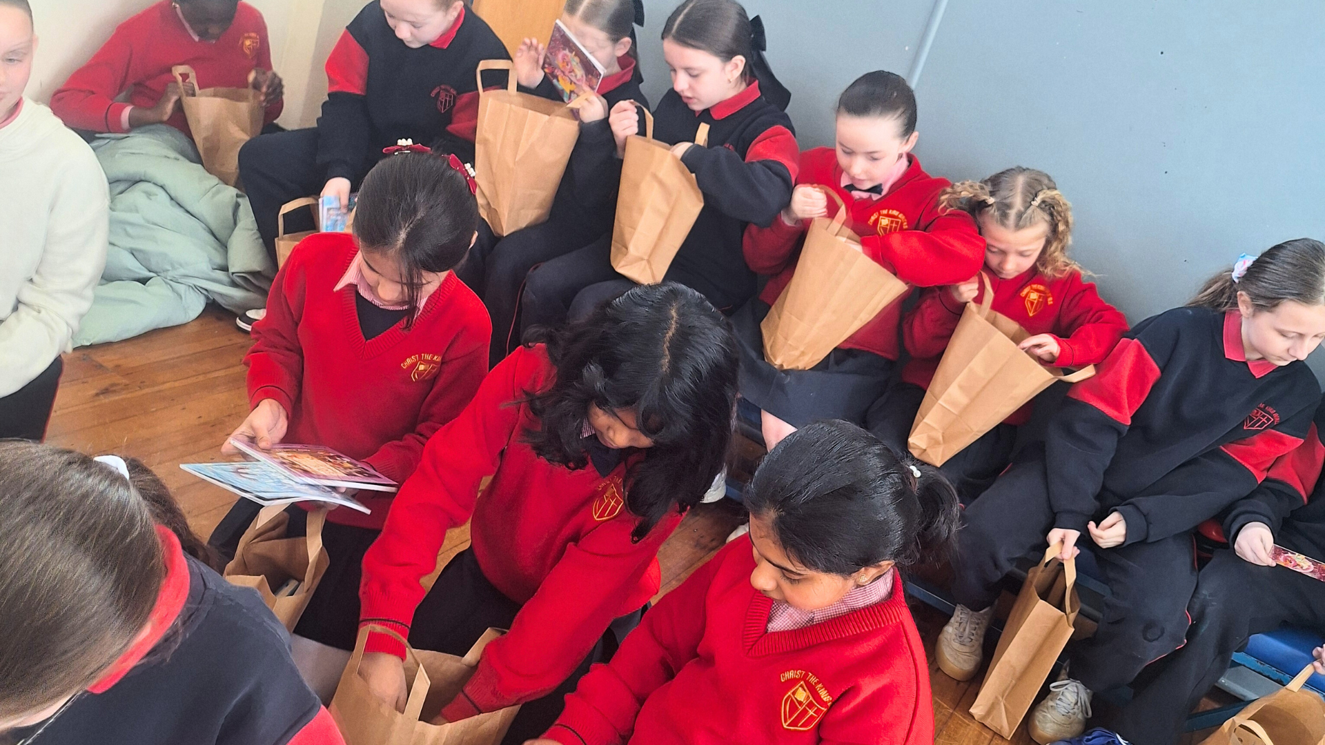 Children opening their Bookbag's