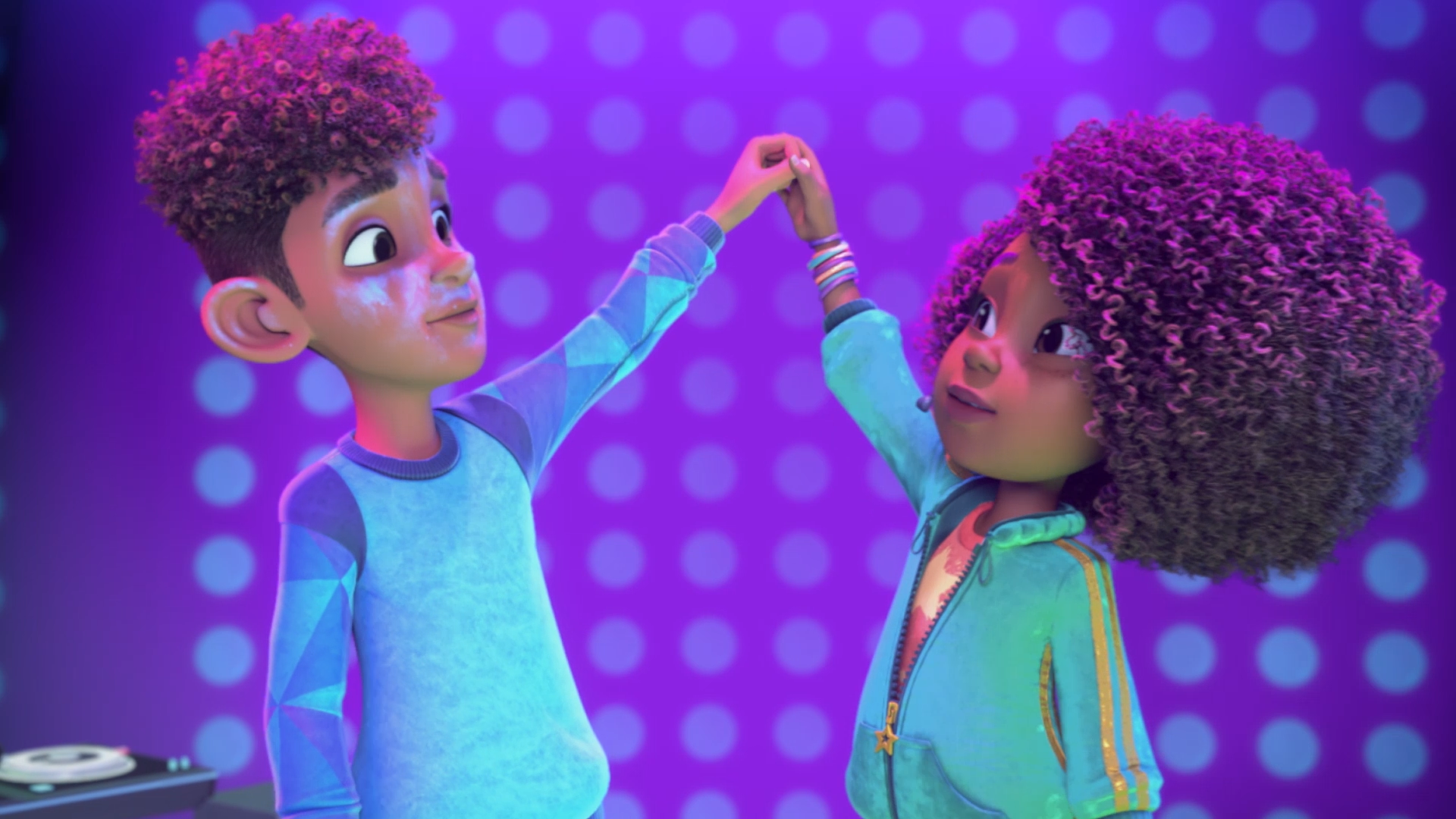 Karma and Winston holding hands up high.