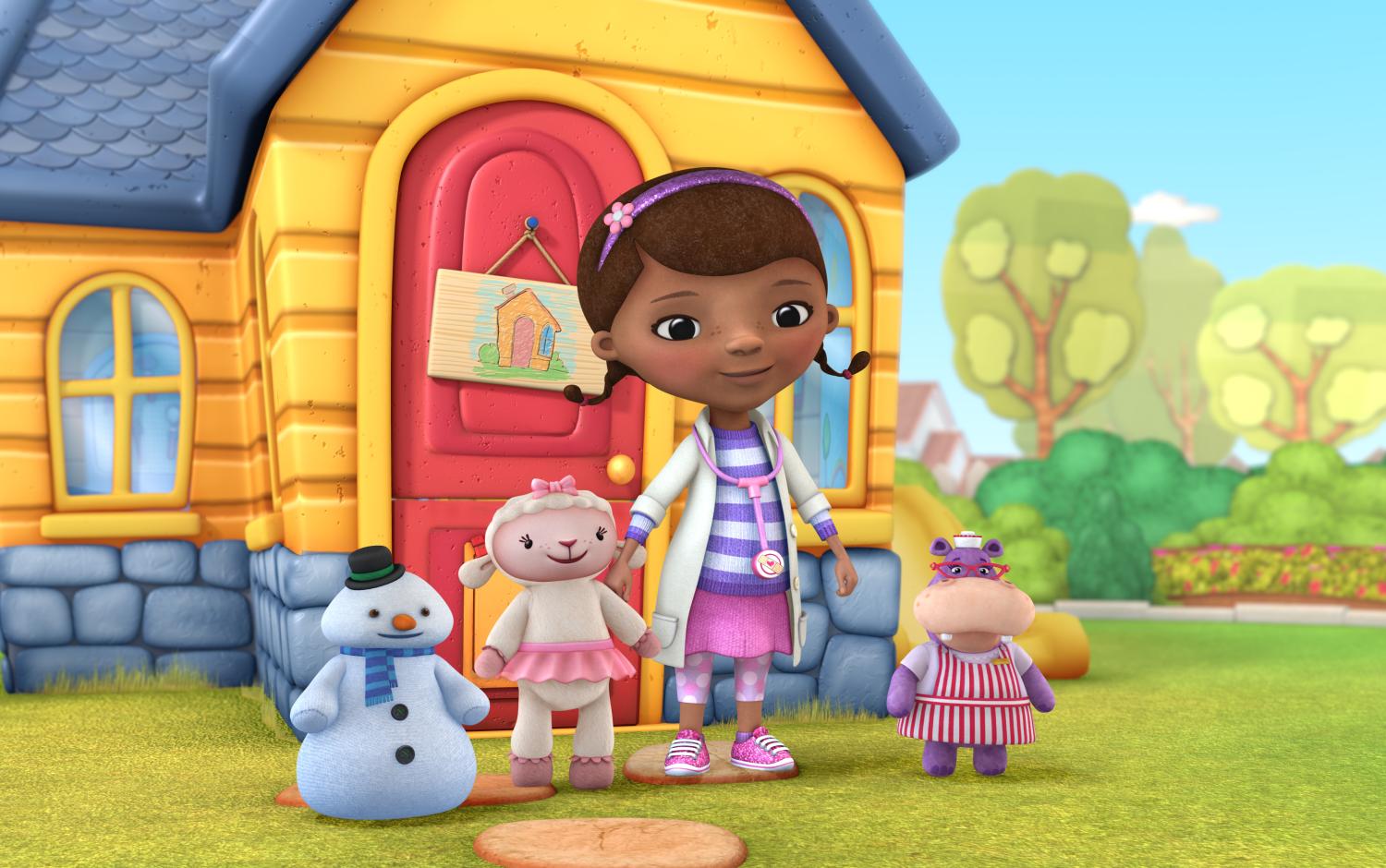 Doc McStuffins standing in front of her clinic with Chilly, Lambie, and Hallie