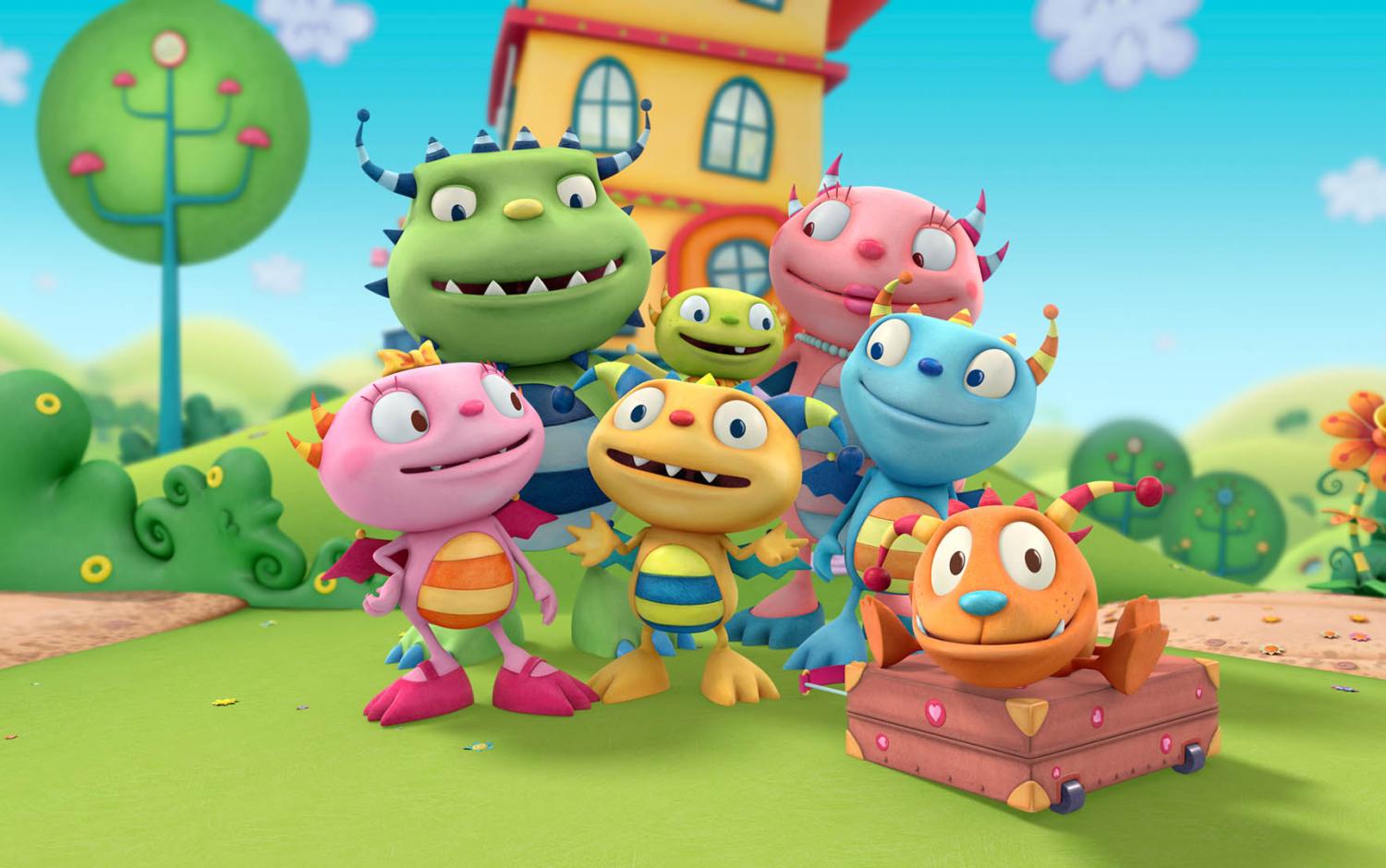 The Hugglemonster family posed together outside their home