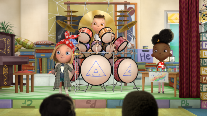 Rosie, Iggy and Ada performing on a stage. Iggy is sitting behind a drum set. Rosie has her hands outstretched. Ada is standing behind a table with various beakers filled with different volumes of water