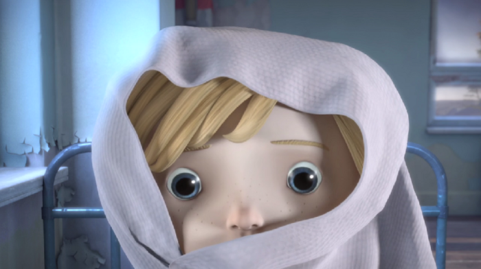 Close-up of Anya in a hooded garment, looking straight ahead.