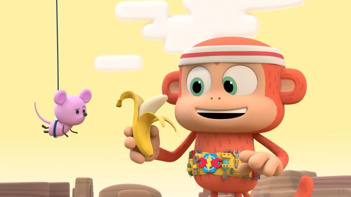 Chico Bon Bon holding a banana while Tiny the mouse is hanging in the air on a thread