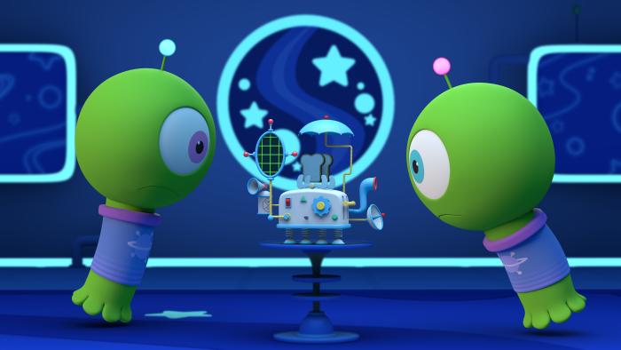Two green aliens inside a spaceship