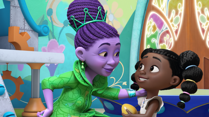 Dee and Miss Emerald, the teacher at the Wonderful School of Oz smiling at each other