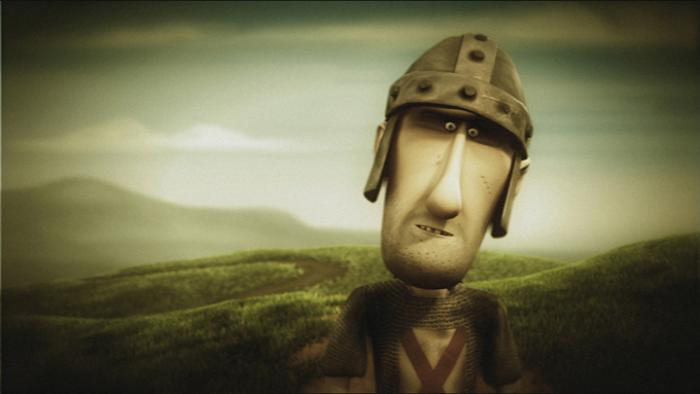 Close-up of a man wearing a helmet, looking serious.