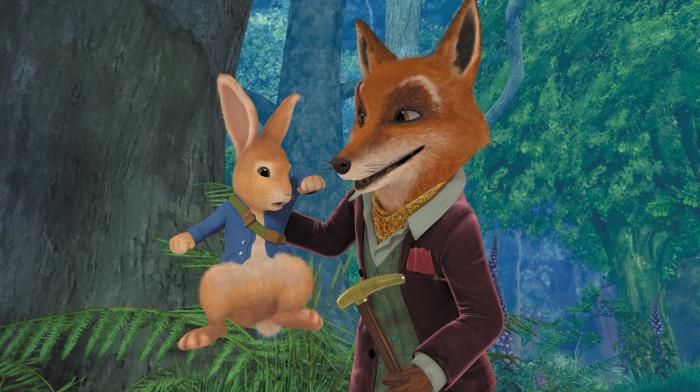 Mr. Tod holding Peter Rabbit