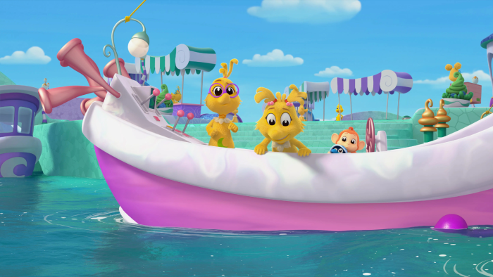 Several Sneetches on a boat in a carnival-like setting with water rides and tents.